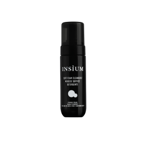Black bottle of INSÏUM foaming cleanser/makeup remover with white label text on a plain background.