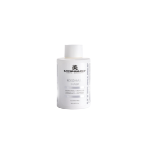 White bottle of UTSUKUSY ExoHair Mask with silver label, stands upright against a plain background
