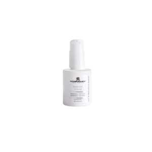 White pump bottle labeled ExoHair Serum, a hair treatment product for at-home use